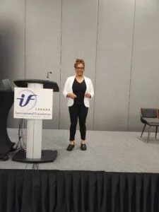 Joyce Odidison speaking at IFEBP Conference